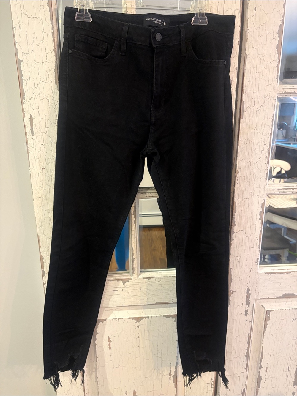 Women’s distressed black jeans from Just Black Denim